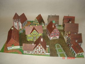 vesnice s domy živnostníků papírová stavebnice Jordan 600